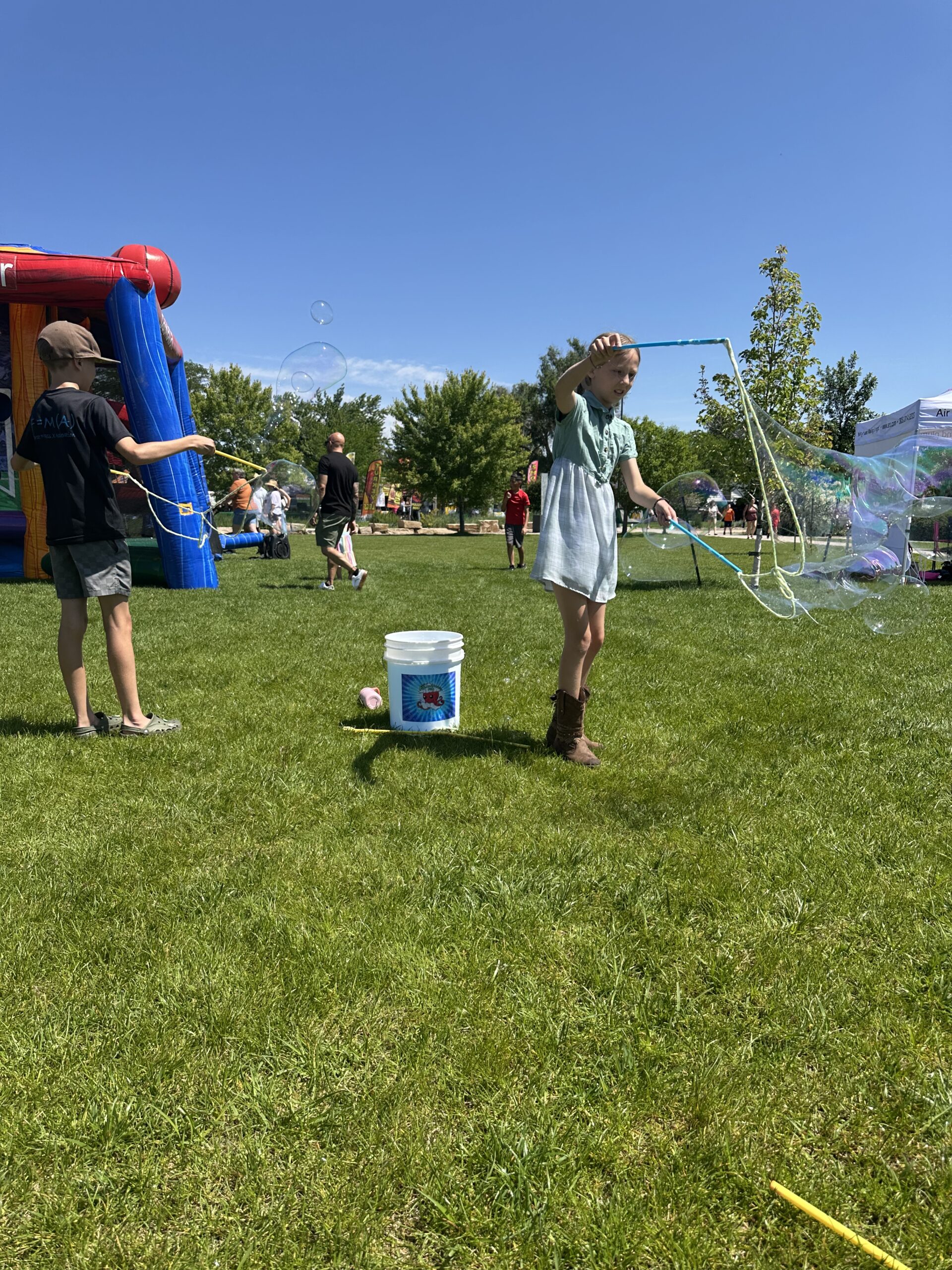 Giant bubbles outdoors at a Front Range event