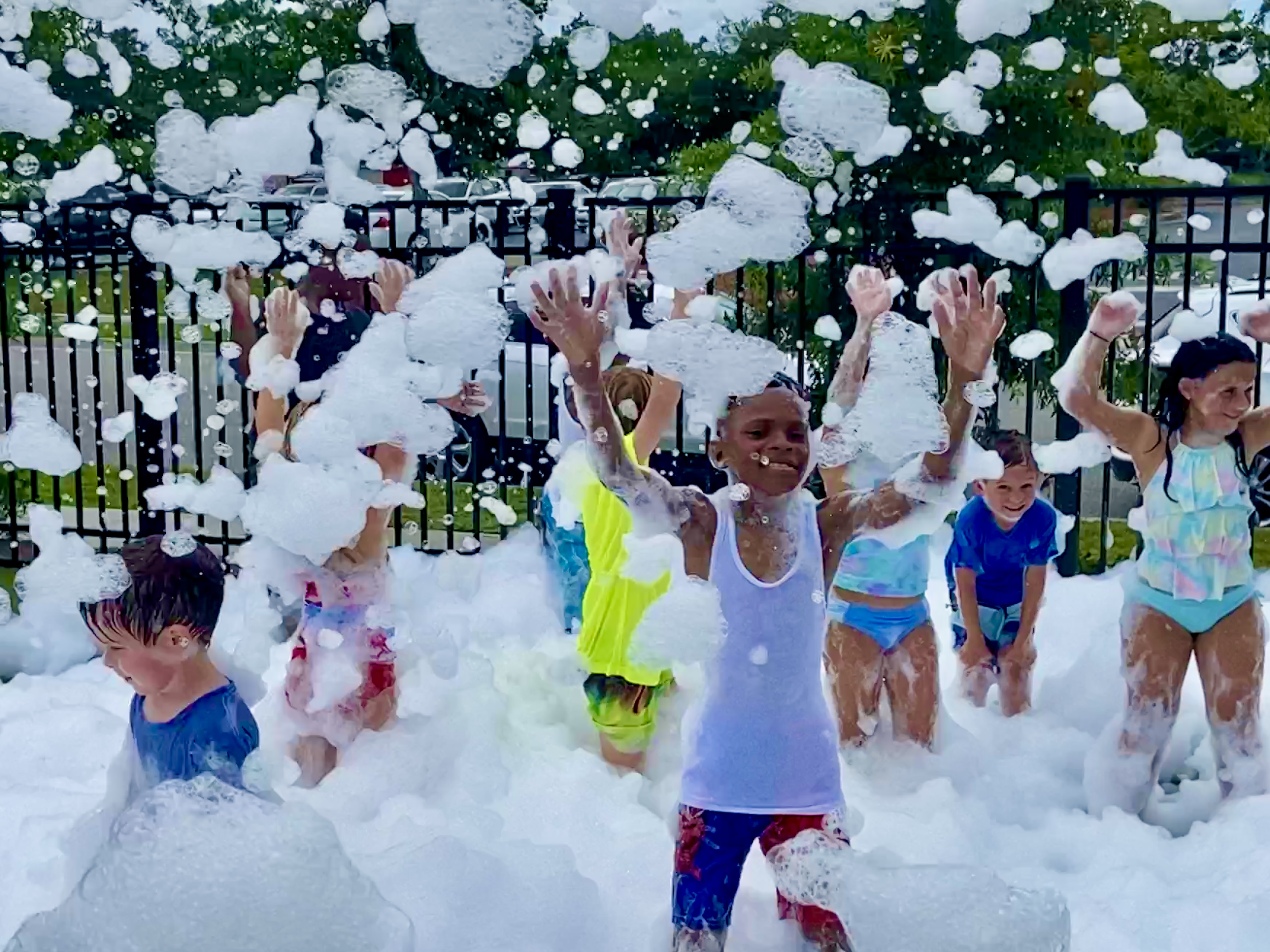 Foamsational Fun operator creating foam for an outdoor event